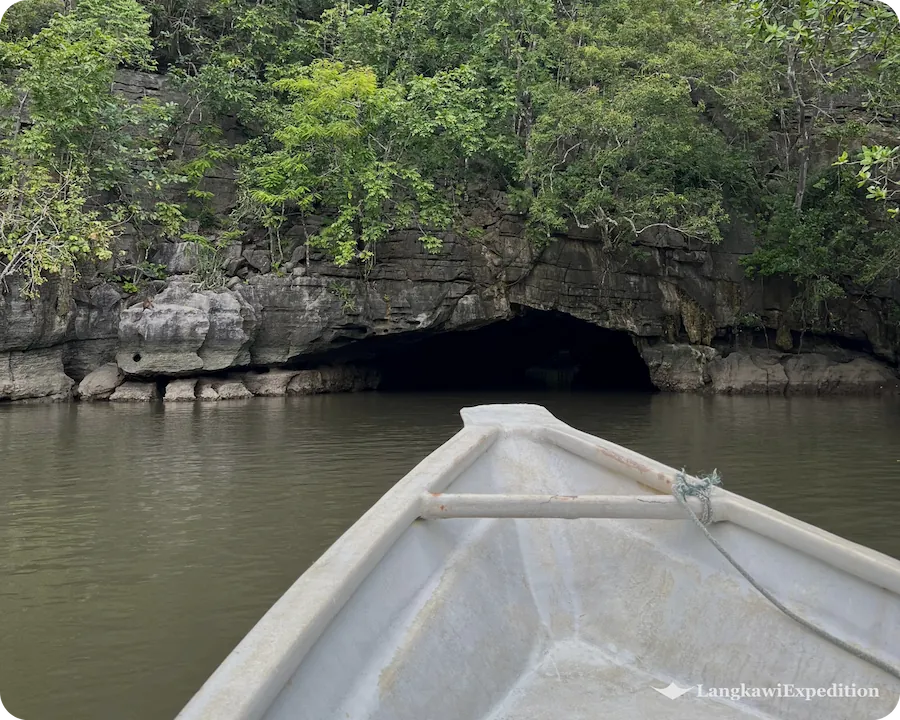Front boat view approaching the natural limestone tunnel of Crocodile Cave