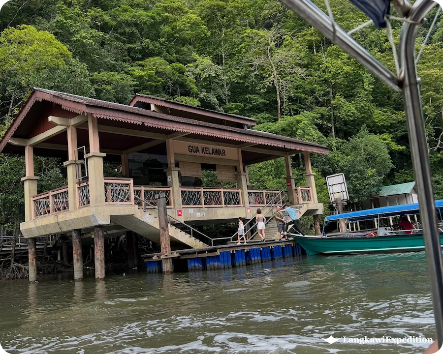 Wooden pier and entrance pavilion jetty for tour boats at Gua Kelawar Bat Cave